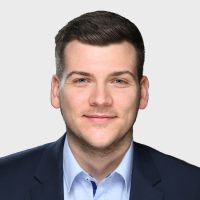 Stephan Katzenberger - Partner Account Manager: Smiling man with black hair and blue eyes