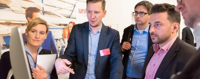 Meeting at a Mercateo stand at a trade fair